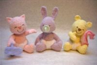 knitted toys of baby bear rabbit and cat