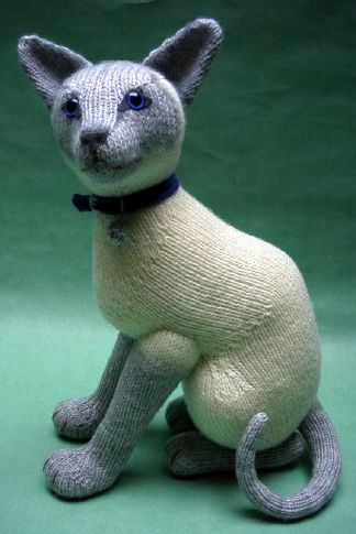 knitted toy of a Siamese cat