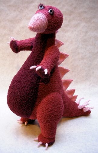 knitted toy of a dinosaur