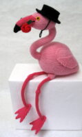 knitted toy of a flamingo dressed as a flamenco dancer