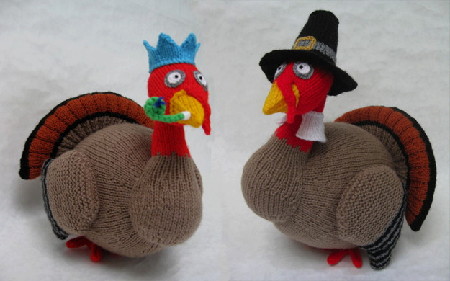 Knitted toys of turkeys dressed in pilgrim fathers outfits