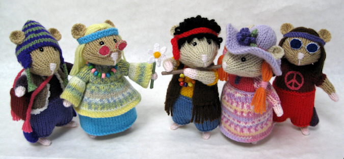 knitted toys of hamsters dressed as hippies