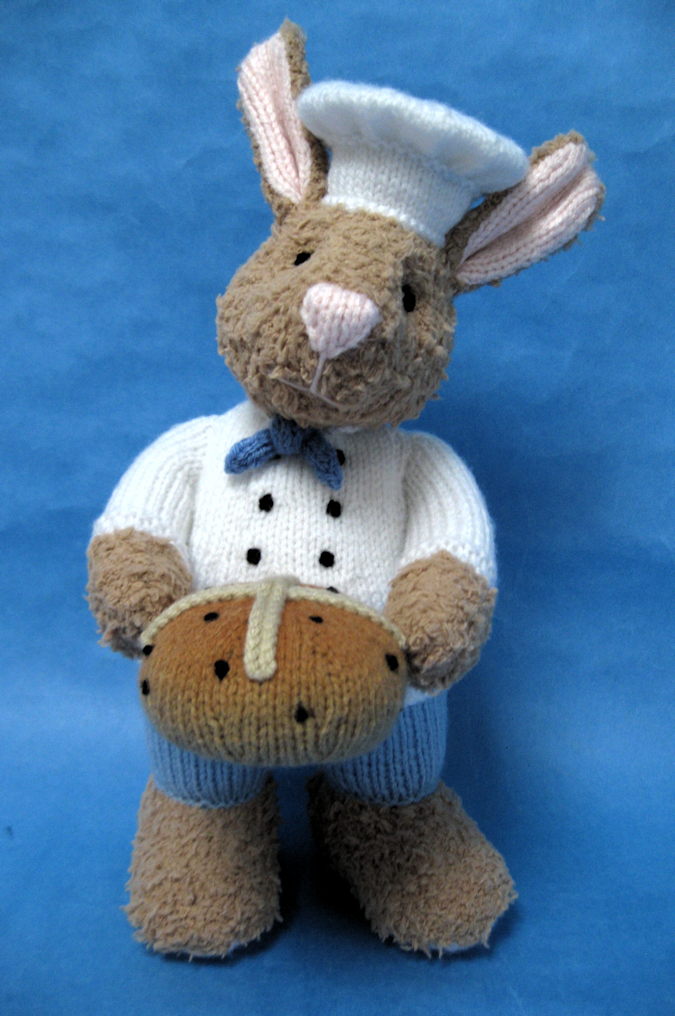 knitted toy of a bunny dressed as a chef