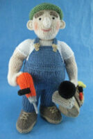 knitted toy of an odd job man with his tools