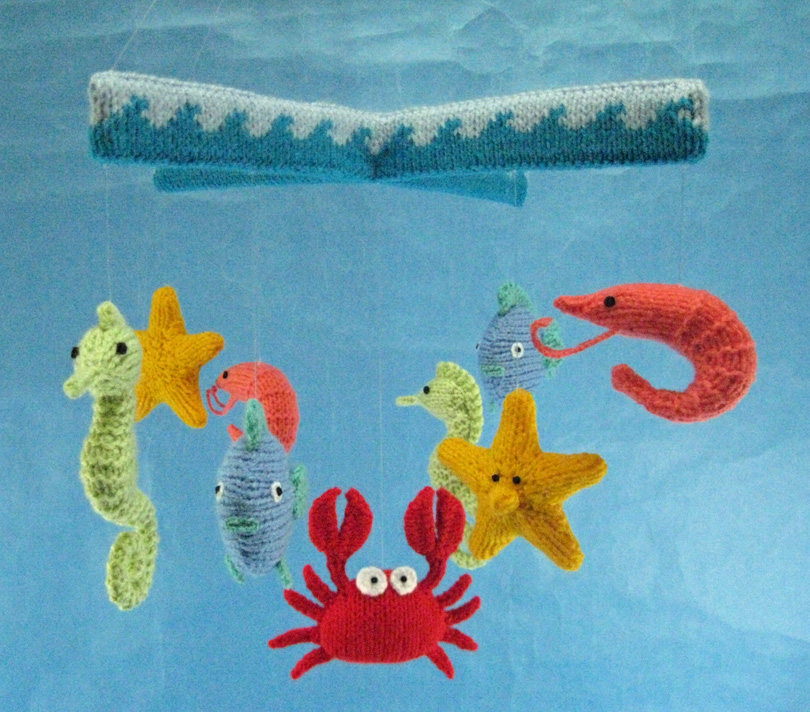 knitted mobile with seaside creatures