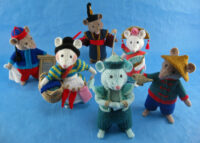 Knitted toy mice dressed as characters from the pantomime Aladdin