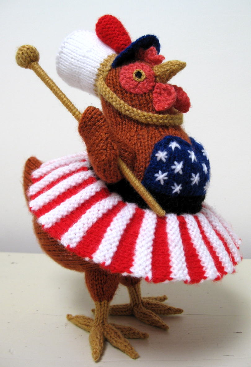 knitted toy of a chicken dressed as a member of an American marching band