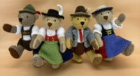 knitted toys of bears in traditional Bavarian costumes