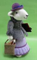 Herdwick sheep dressed as a country lady knitted toy