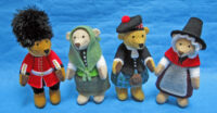 knitted toys of bears in traditional national outfits for the nations of the UK