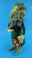 knitted toy of a green man figure