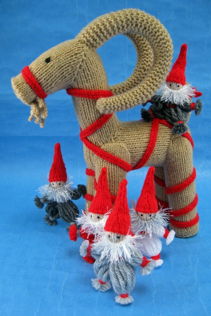 knitted toys of a Scandinavian Yule goat and gnomes