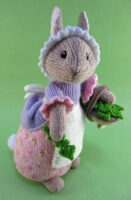 knitted toy of rabbit dressed in quaint country attire