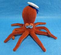 knitted toy of an octopus in a sailors hat