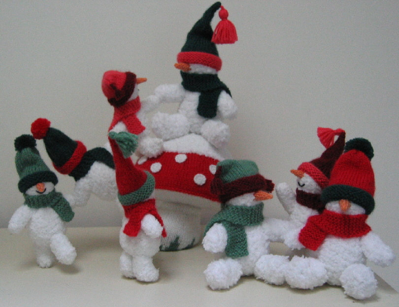 knitted toys of snowmes characters