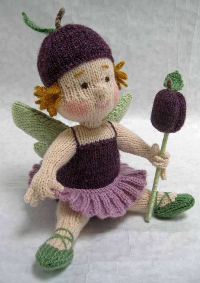 knitted toy of a plump baby fairy