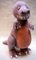 knitted toy of a Tyrannosaurs Rex