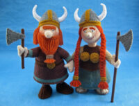 knitted toys of male and female Vikings